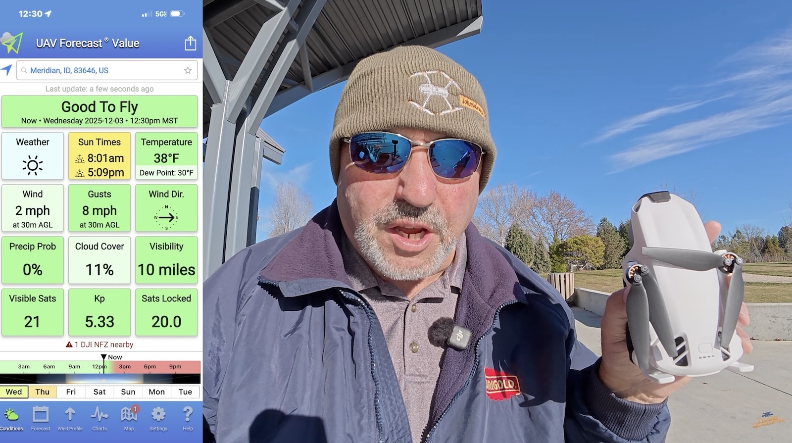 Reviewer holding the Skyrover S1 beside a UAV Forecast good to fly screen.