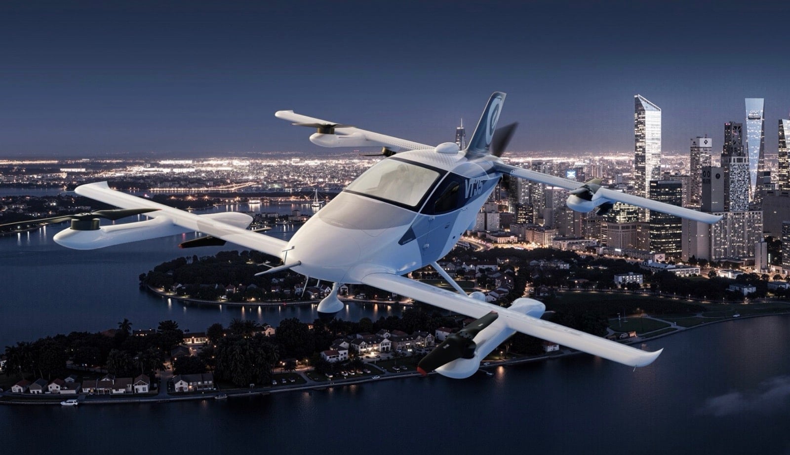 EHang VT35 eVTOL banking over a lit waterfront skyline at night.