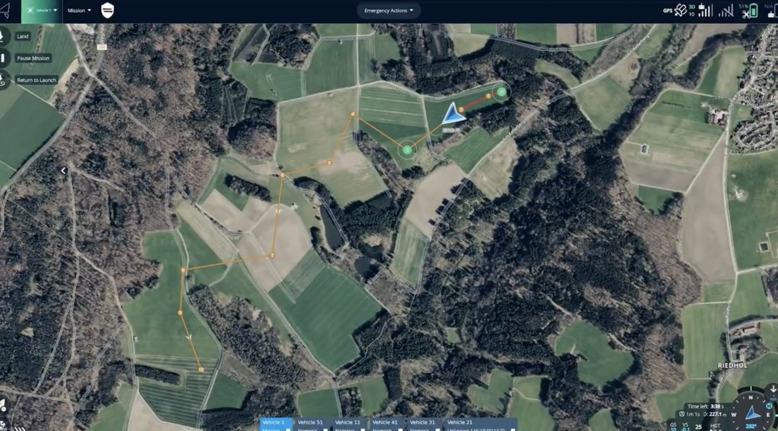 Screenshot of a drone mission control map showing farmland with unit markers.