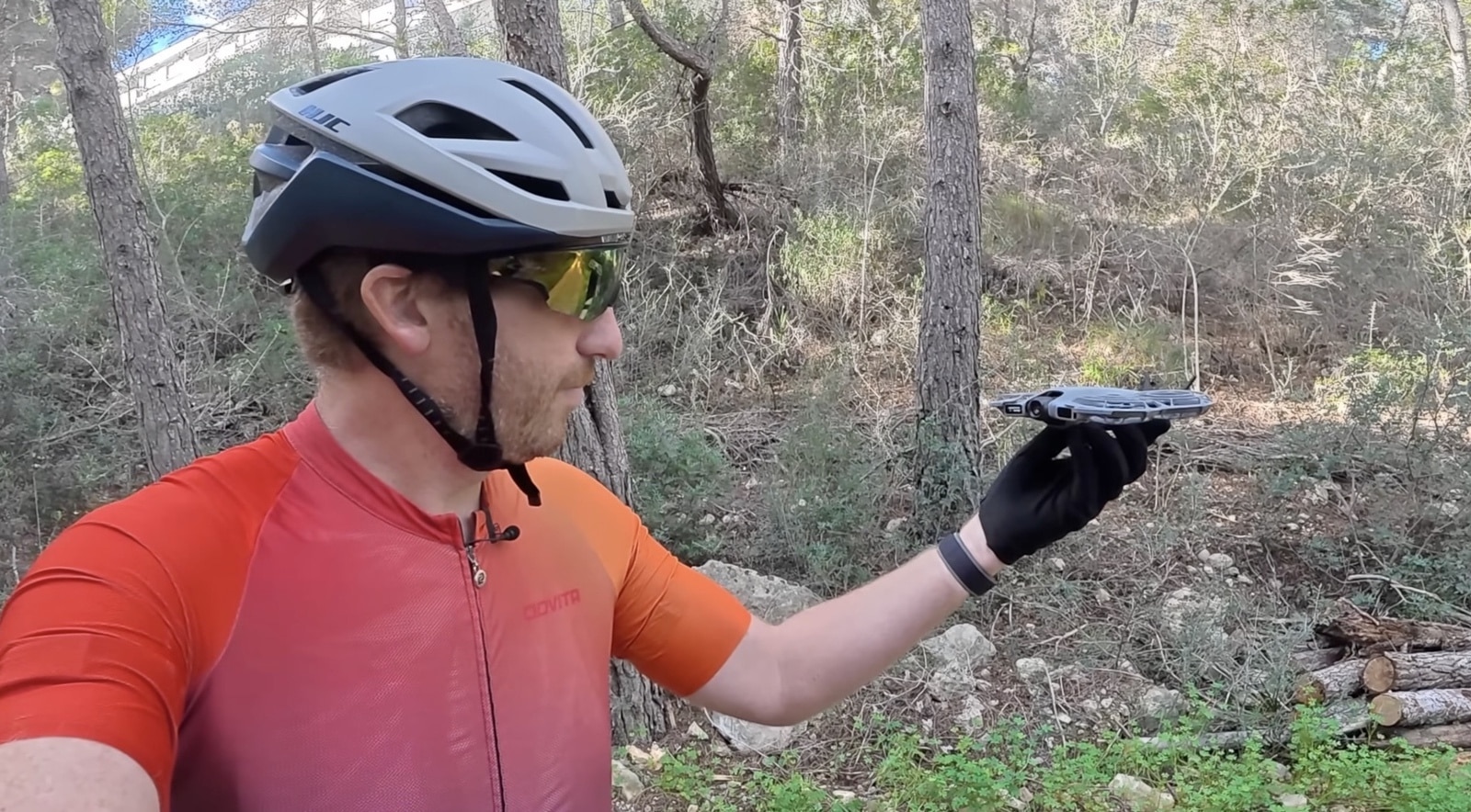 Person holding a drone in nature. DJI Neo 2 Gauntlet Test: From Tight Trails To Abandoned Resorts At 48 km/h