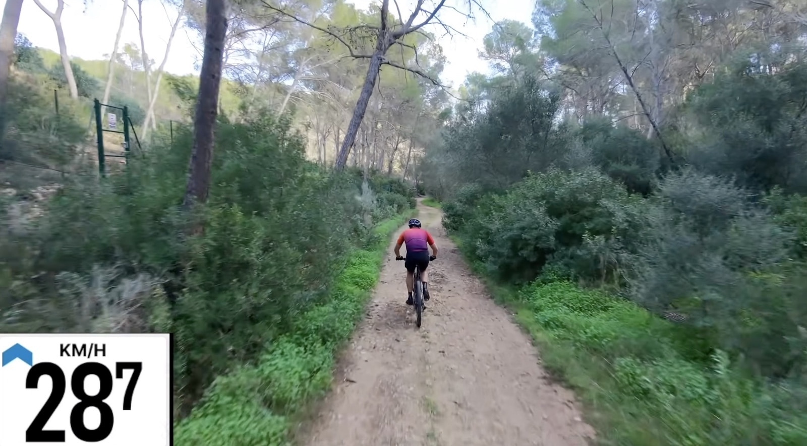 Cyclist on a dirt trail outdoors. DJI Neo 2 Gauntlet Test: From Tight Trails To Abandoned Resorts At 48 km/h