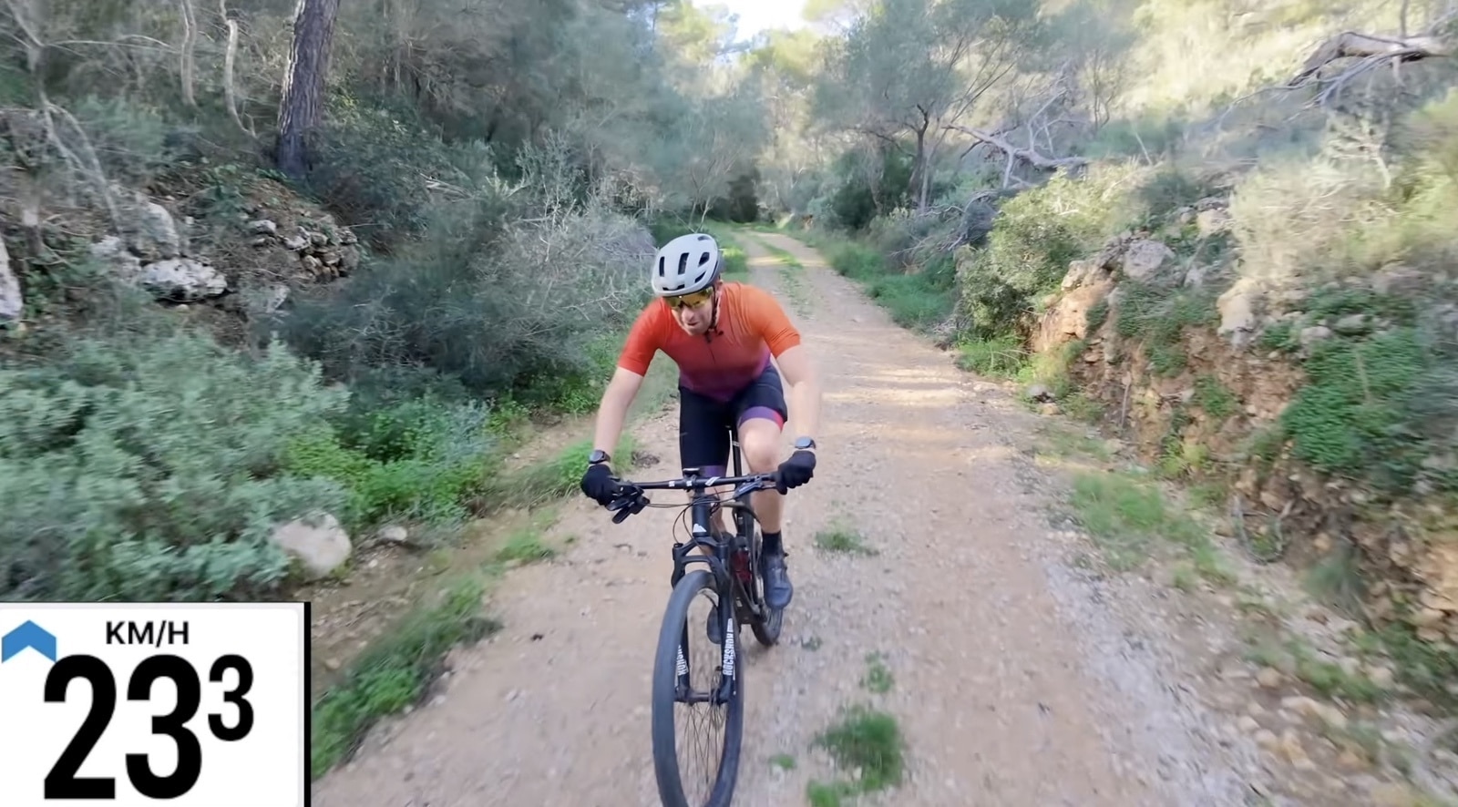 Cyclist navigating a rocky trail.