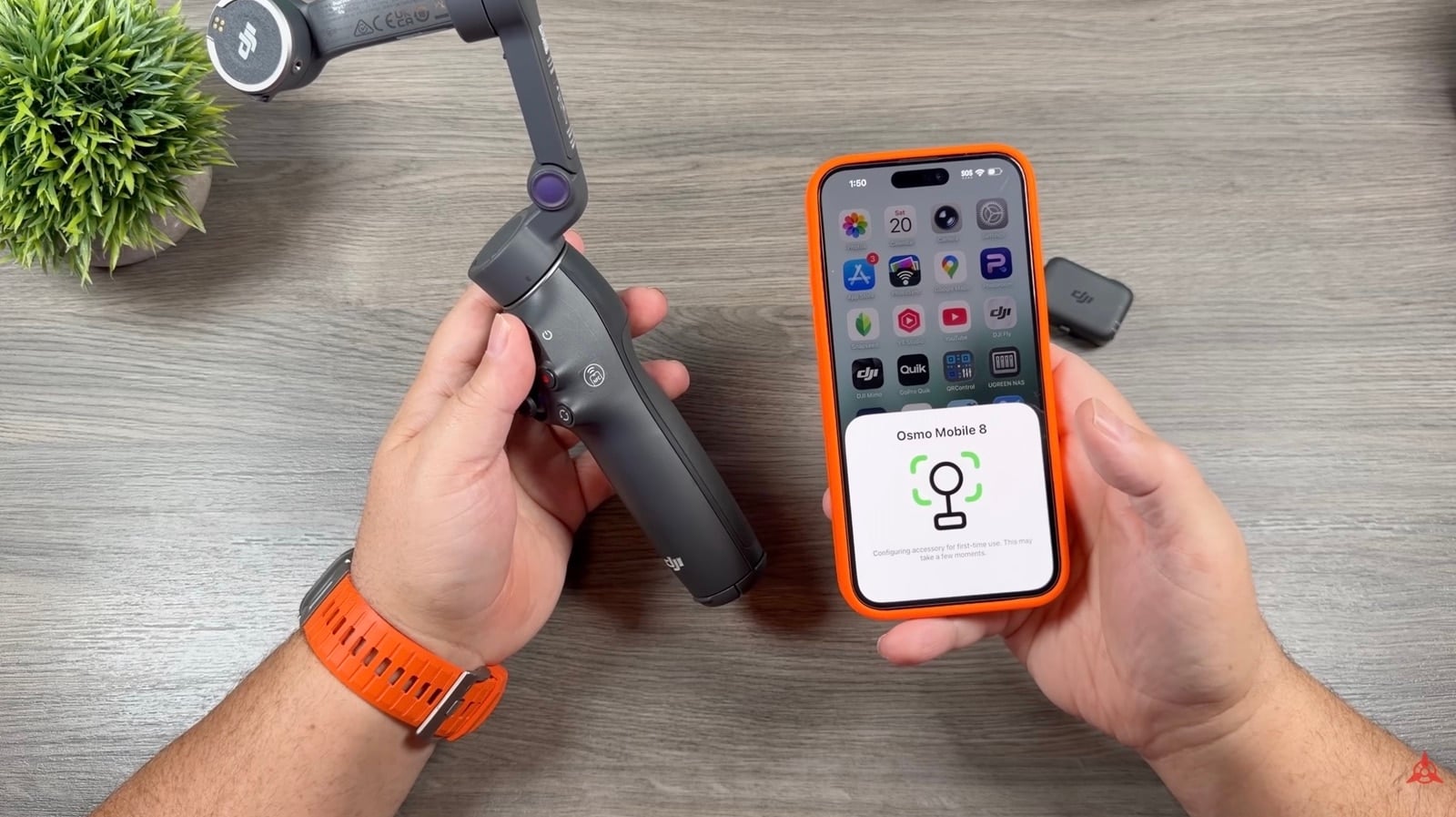 An iPhone on the Osmo Mobile 8, paired by NFC for Apple DockKit tracking.