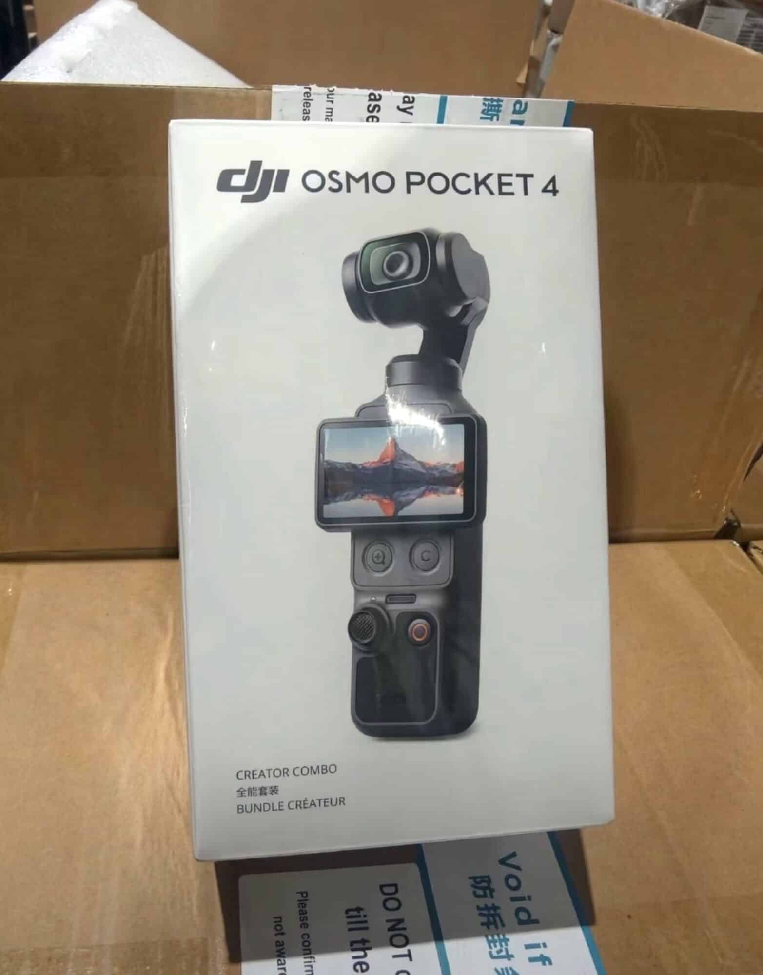 Leaked DJI Osmo Pocket 4 Creator Combo retail box resting on warehouse cartons.
