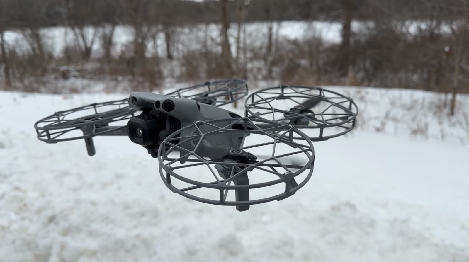 The guarded Mini 5 Pro, pitched for indoor real estate work in tight spaces.