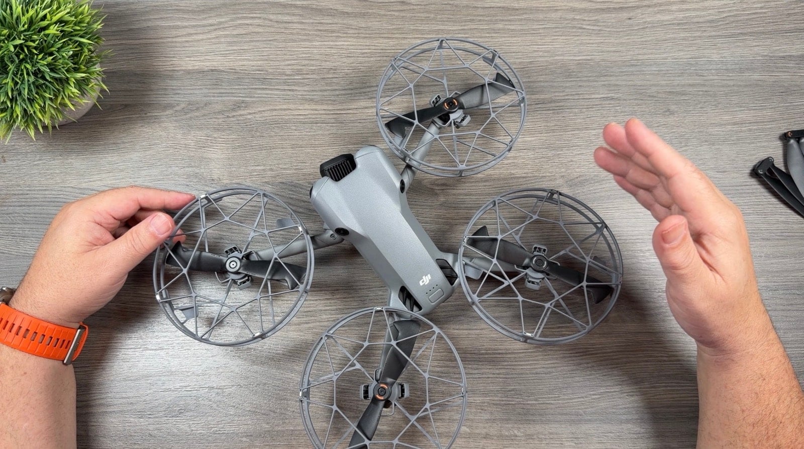 The Mini 5 Pro with all four guards fitted for full 360-degree propeller protection.