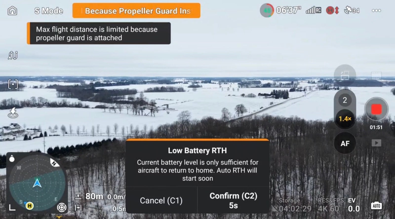 The on-screen warning capping flight at 1,640 feet (500 meters) with guards fitted.