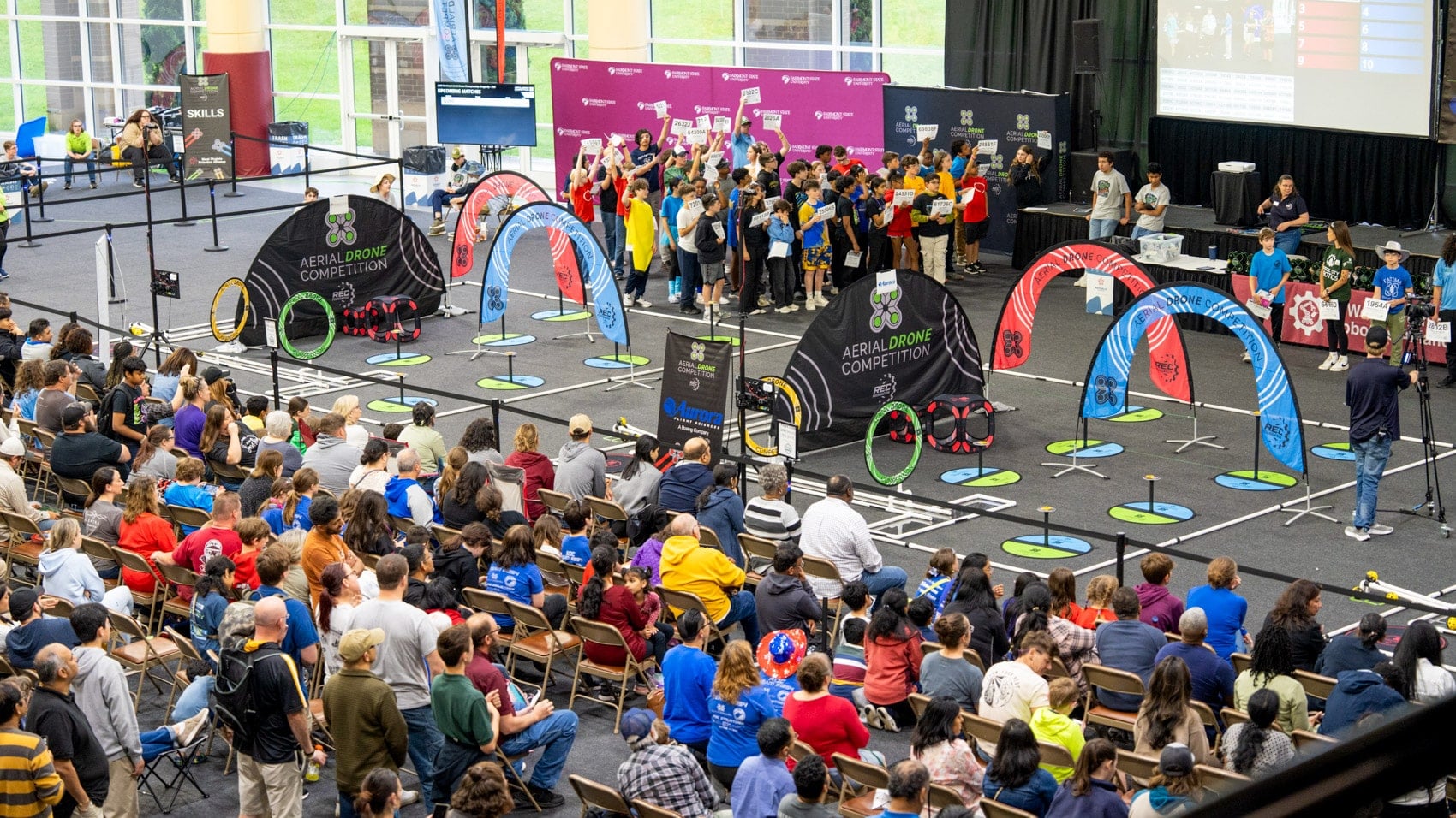 Two teams sharing the field during the Teamwork Mission of the competition.