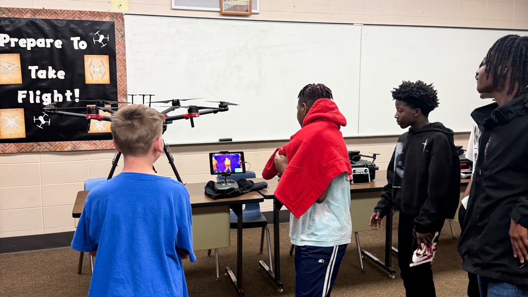 Career center students preparing an aircraft for a training flight.