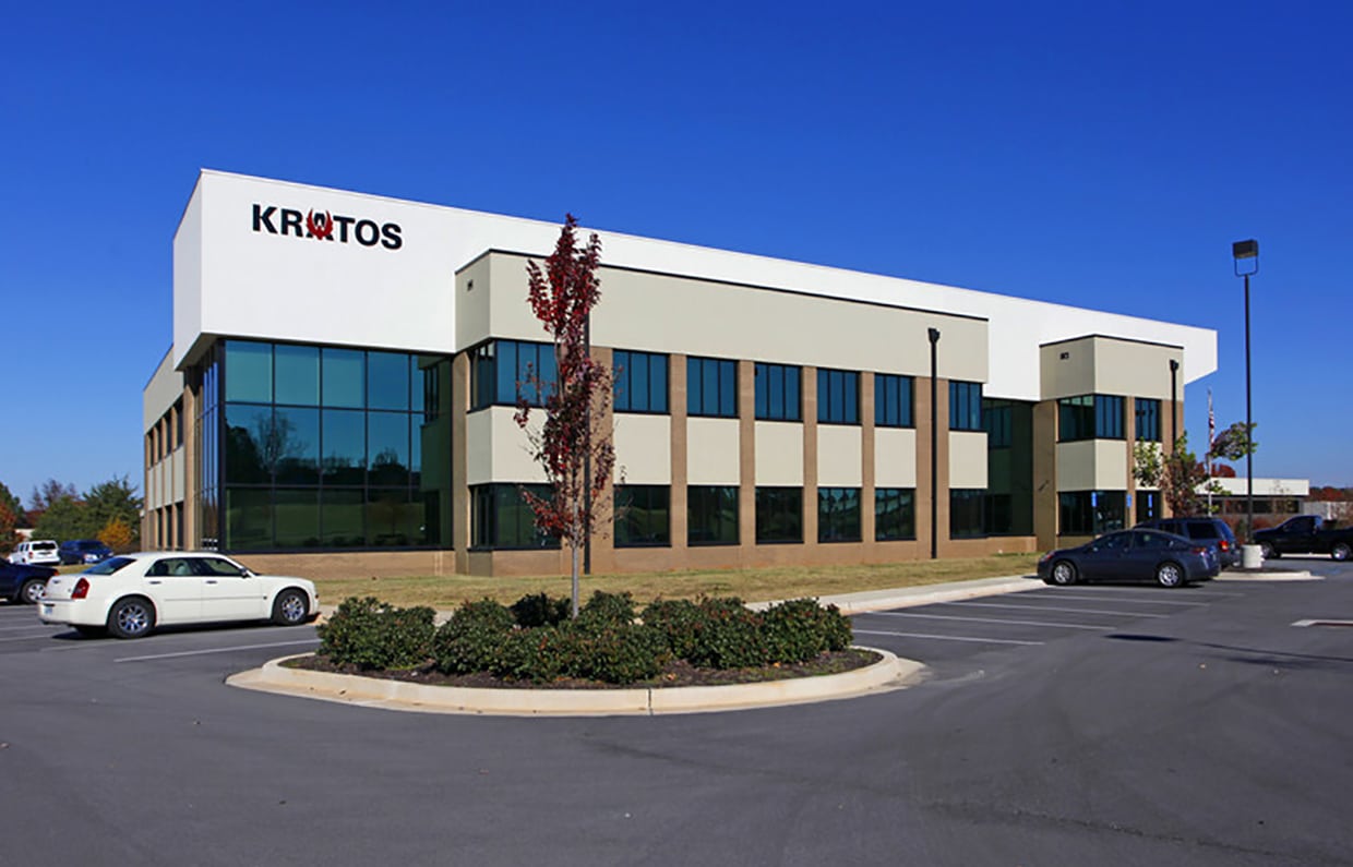 Kratos office building with company signage above the entrance.
