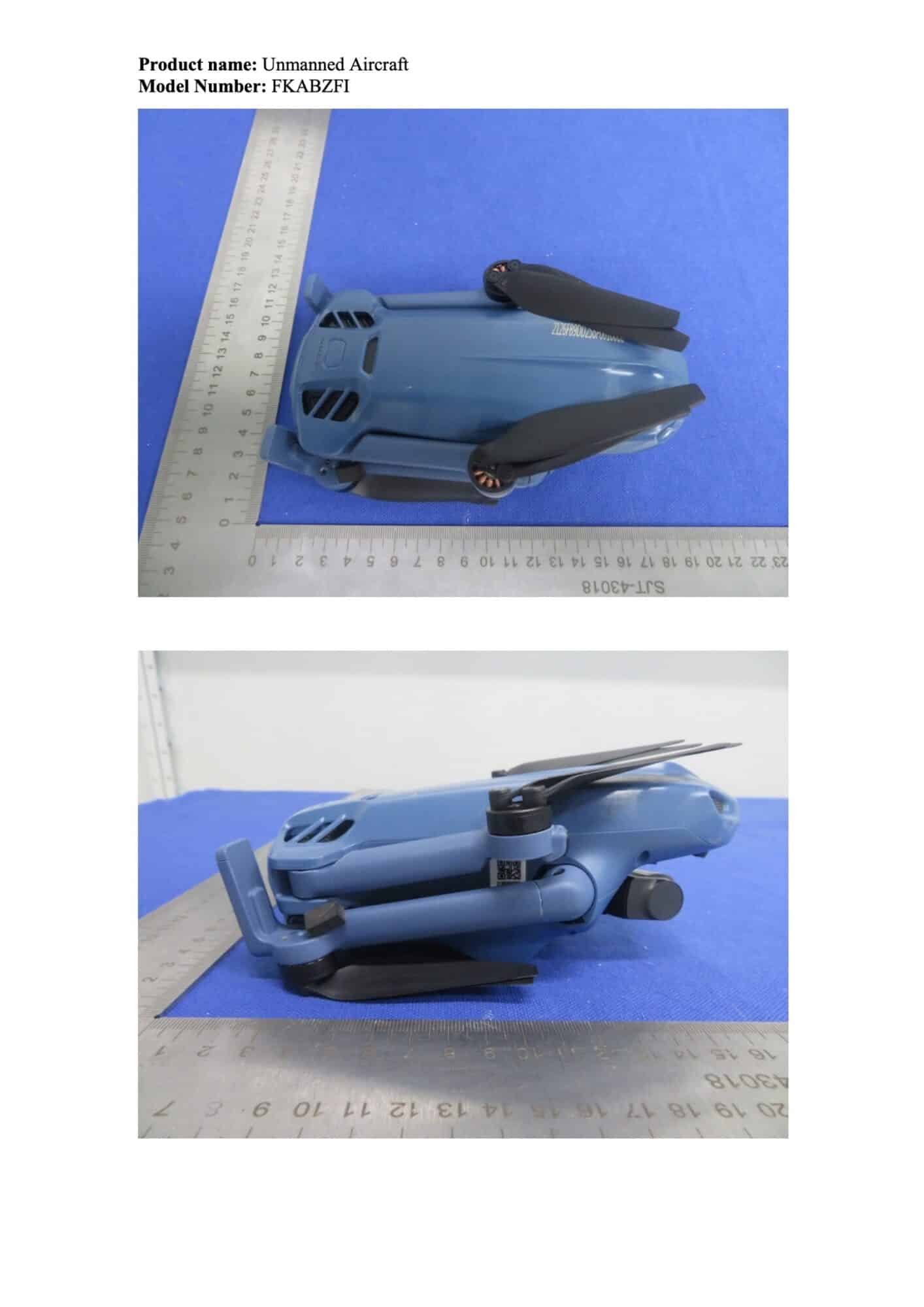 Filing page with the folded drone laid along a ruler from both sides.