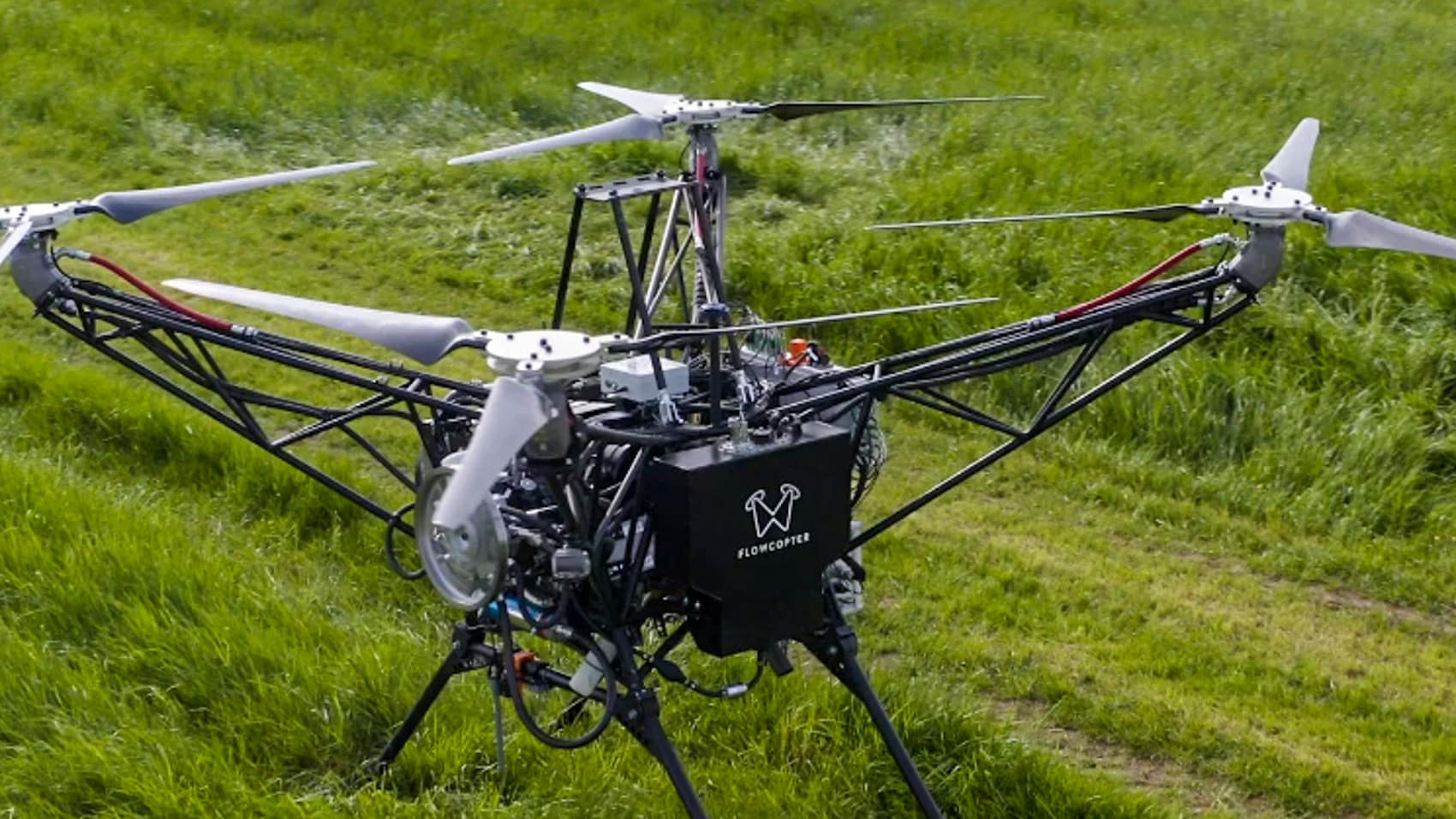 FC-100 rotor system, driven hydraulically by an internal combustion engine rather than batteries.