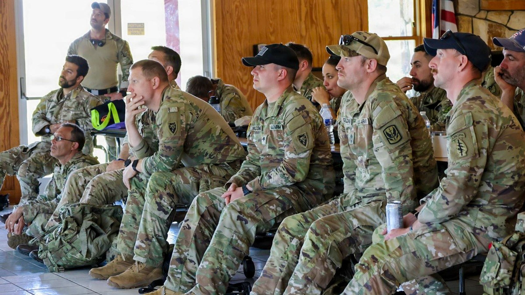 Soldiers reviewing drone imagery on a controller during the Patriot training series.