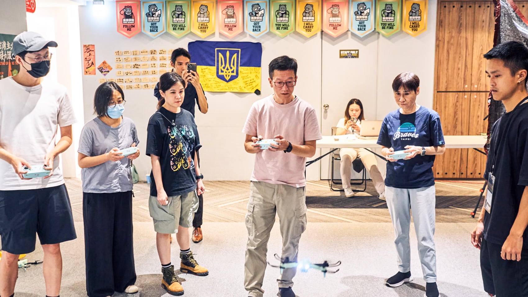 Civil defense students practicing observation flights in the Taipei classroom.