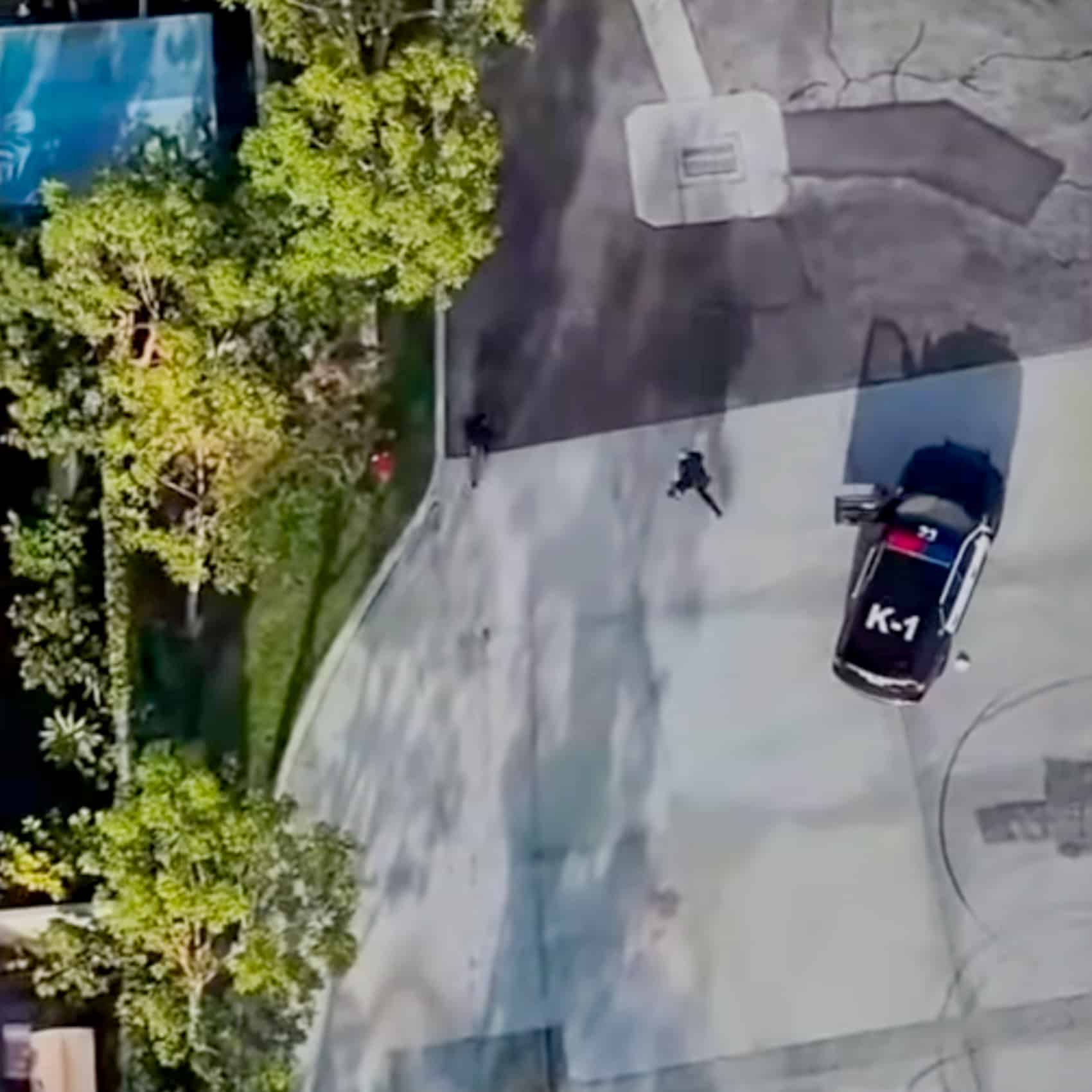The Buena Park police drone holds overwatch as officers close in on the pair.