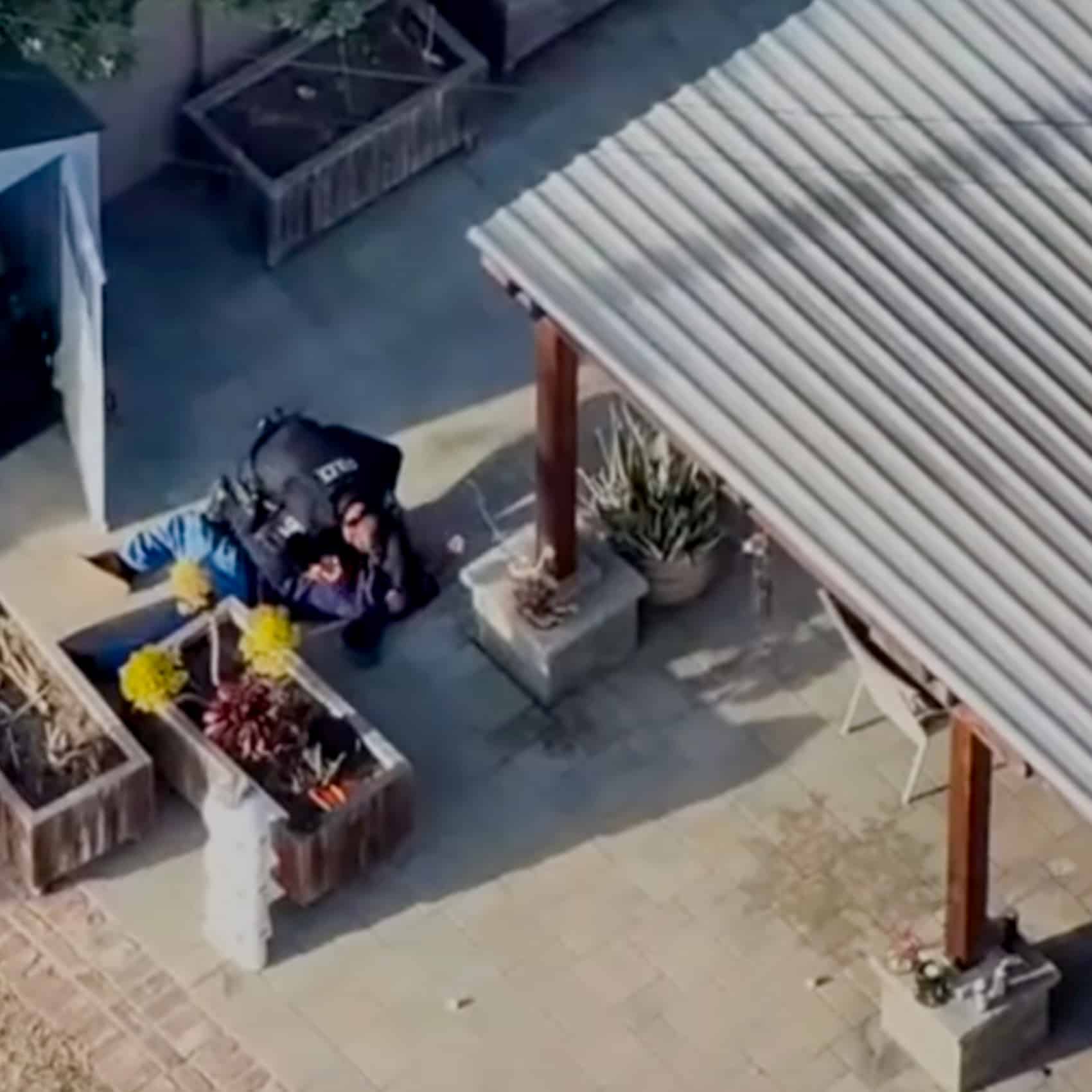 One suspect breaks away on foot through Buena Park residential streets and backyards.