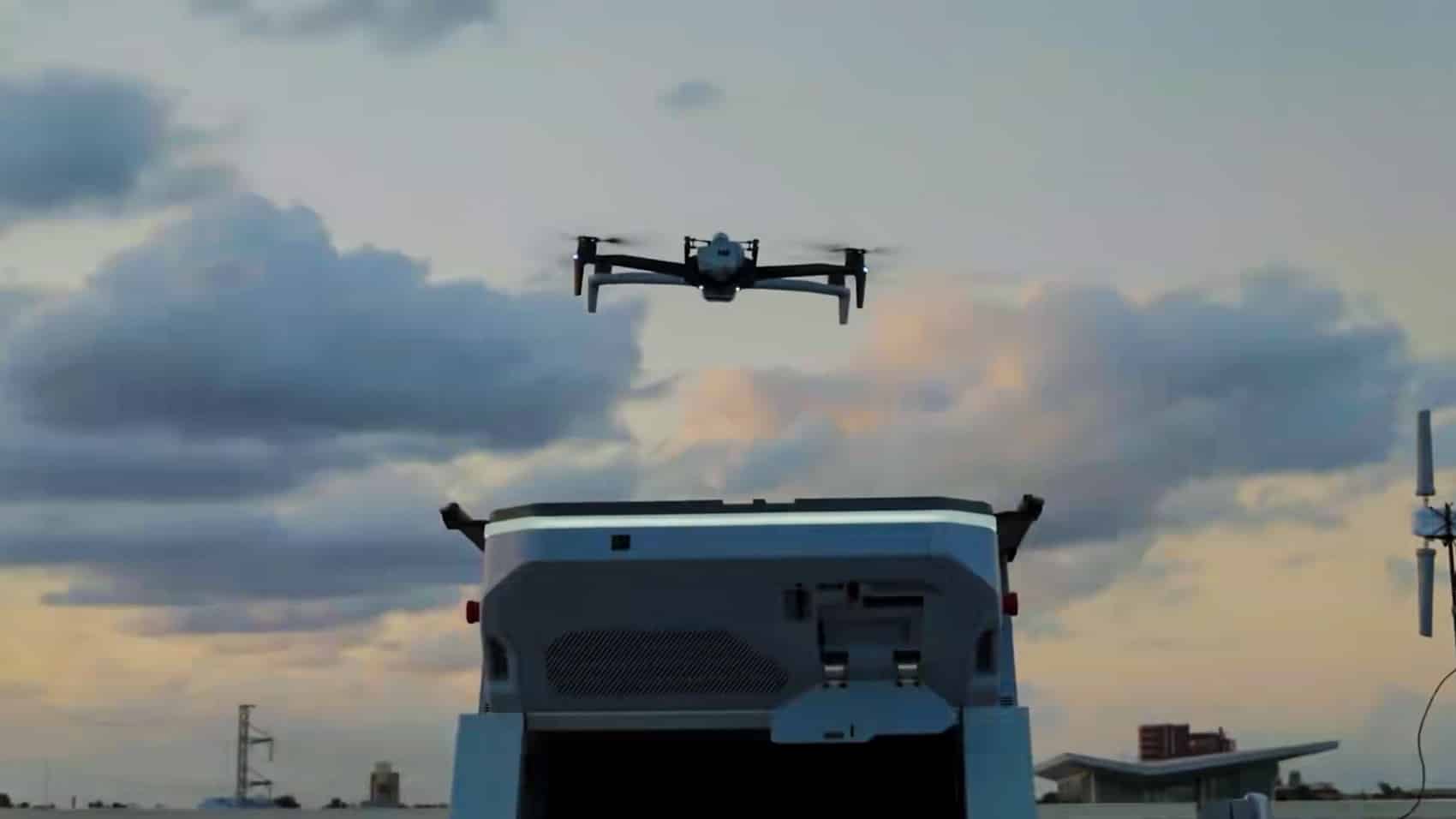 Skydio drone lifting off from an Orlando Police rooftop dock.