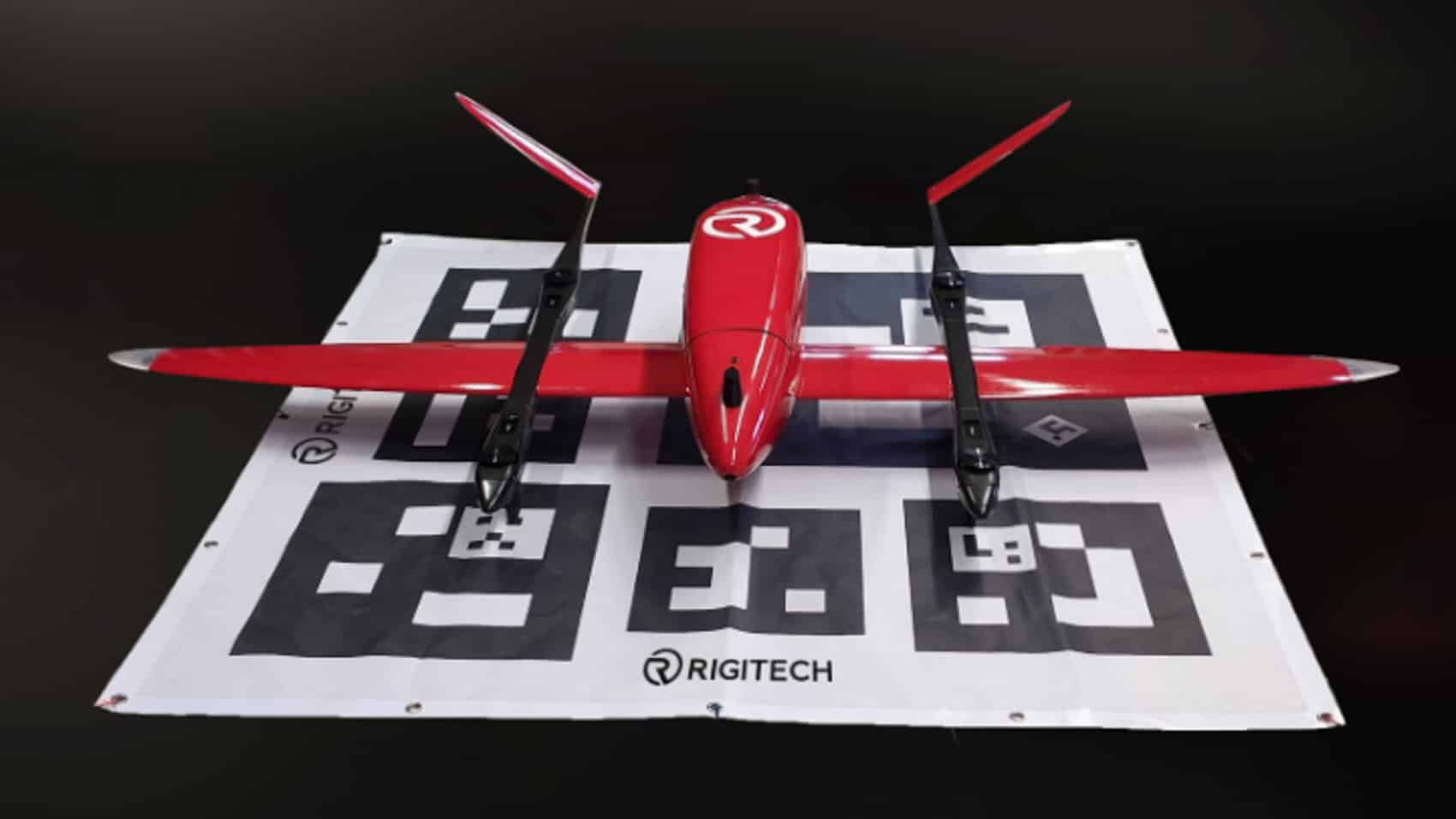 The RigiTech Eiger parked on a marked RigiTech landing pad after a flight.
