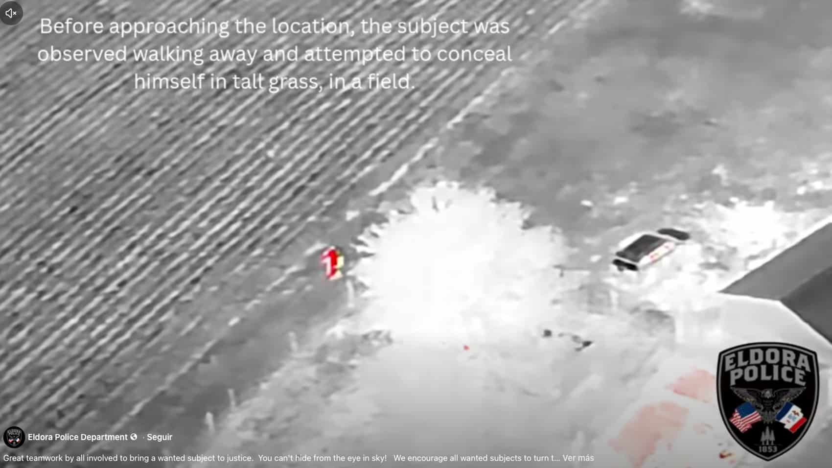 Aerial frame of patrol vehicles staged outside the Iowa residence.