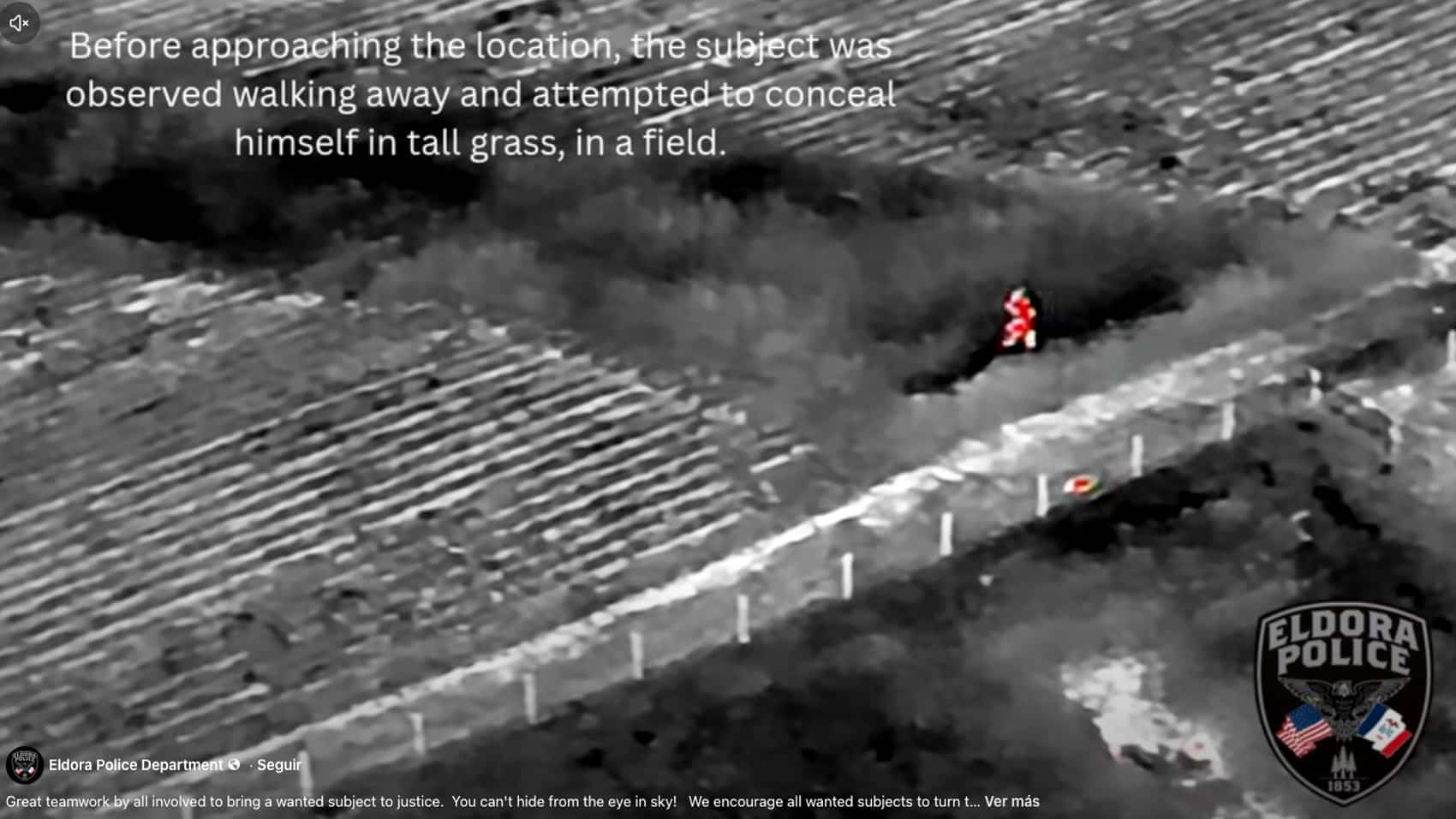 Drone footage of the suspect moving away from the house toward the field.