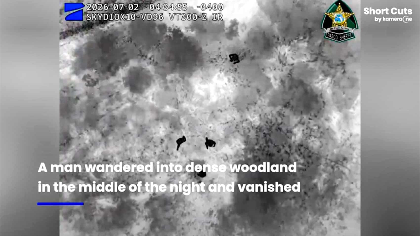 Thermal drone view showing the lost man as a bright shape among cooler trees.