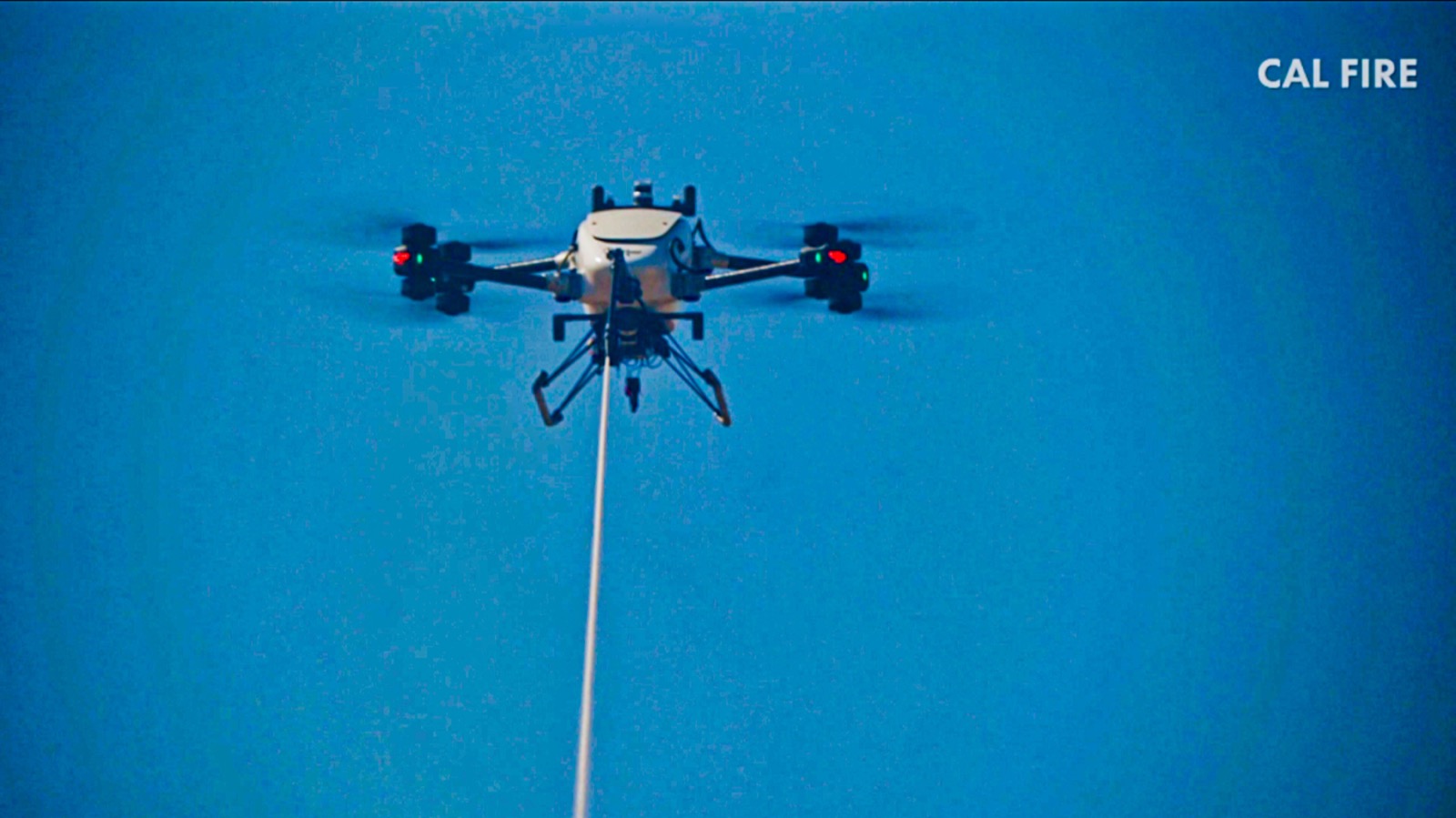 Cal Fire personnel examine Seneca autonomous firefighting drones during the July 15 field test
