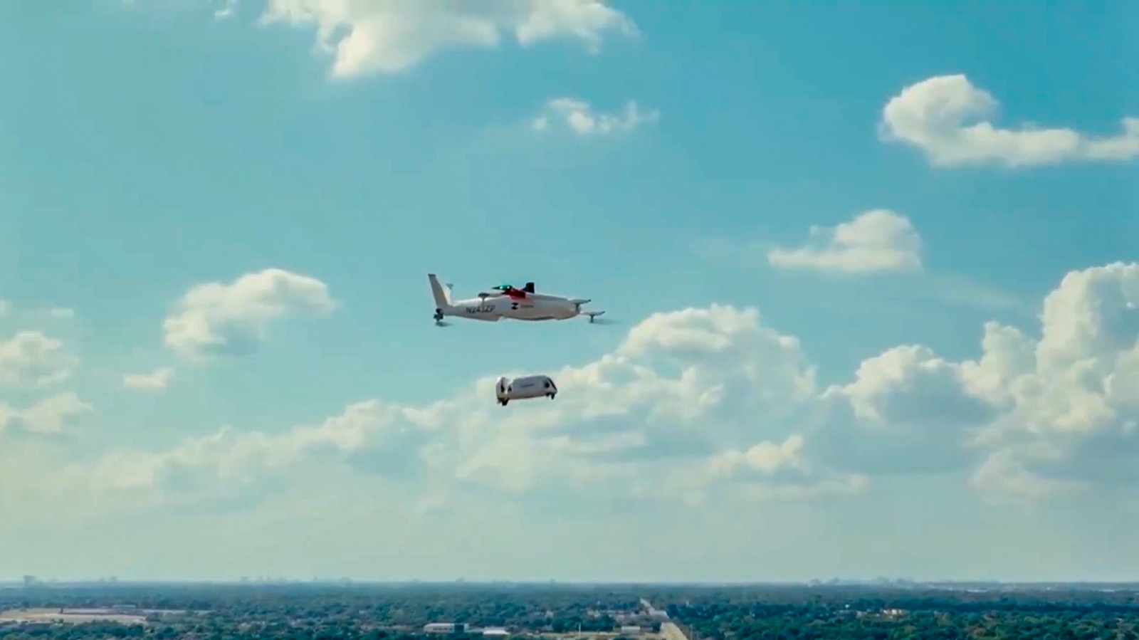 Zipline Platform 2 drone delivering a package