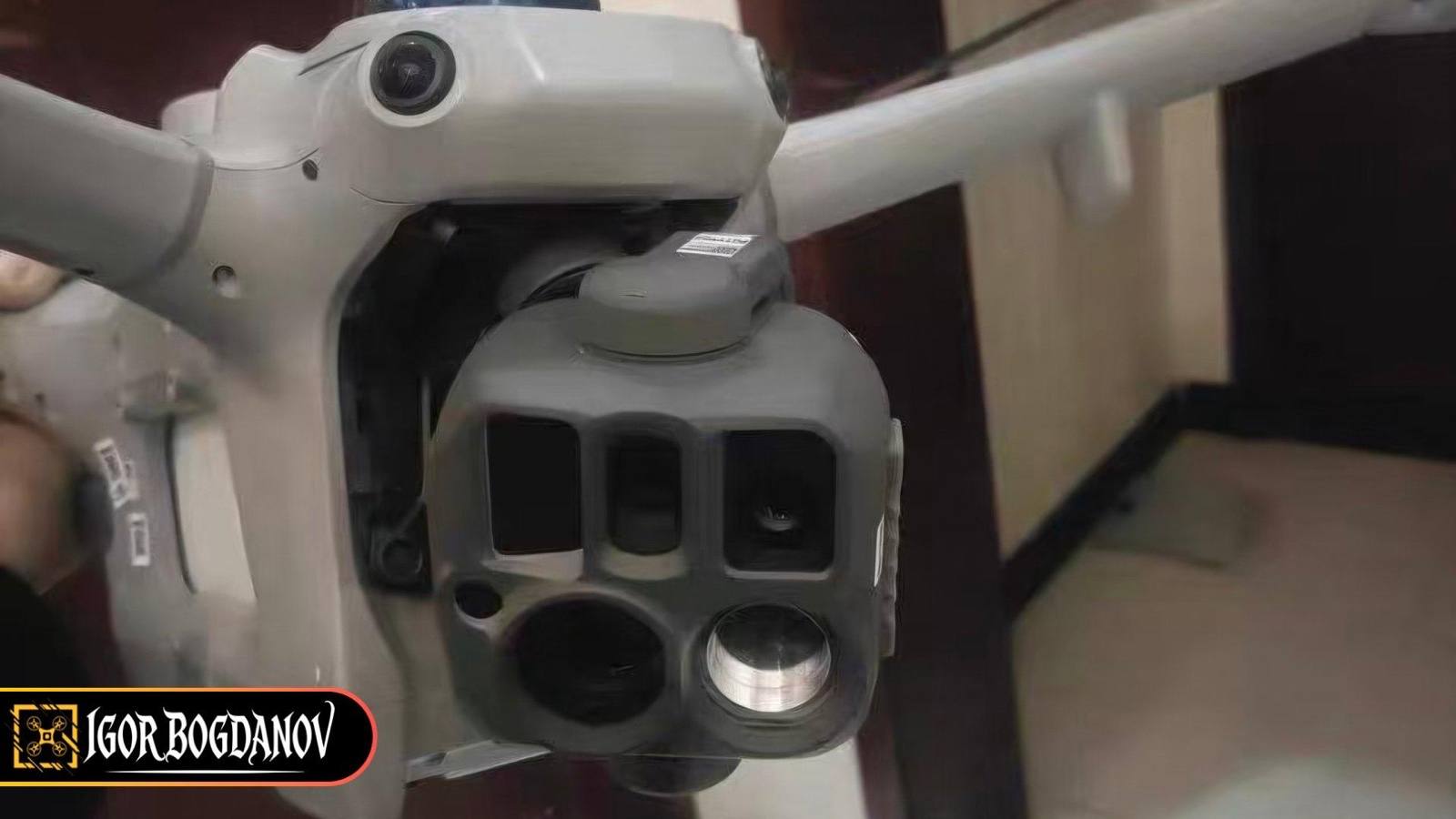Close-up of the purported DJI Matrice 5 gimbal showing five sensor windows across two rows and a polished laser rangefinder lens
