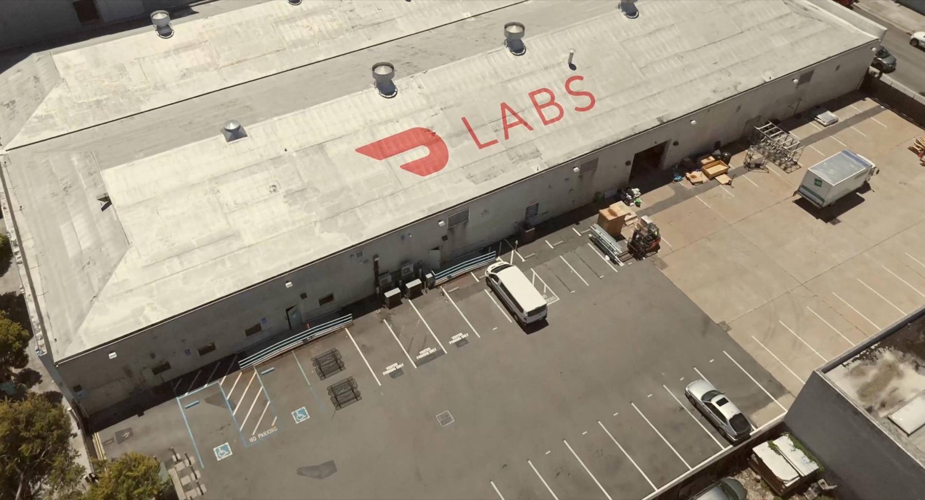 Aerial view of the DoorDash Labs facility with the DoorDash logo and LABS across the roof