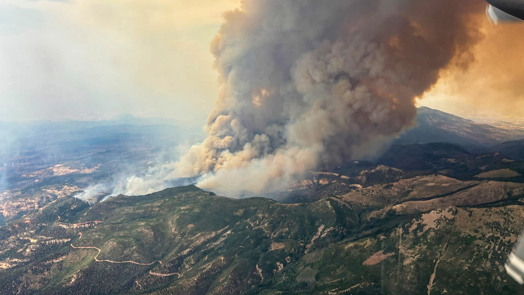 Firefighters working the Babylon Fire in San Juan County, Utah as drones support containment