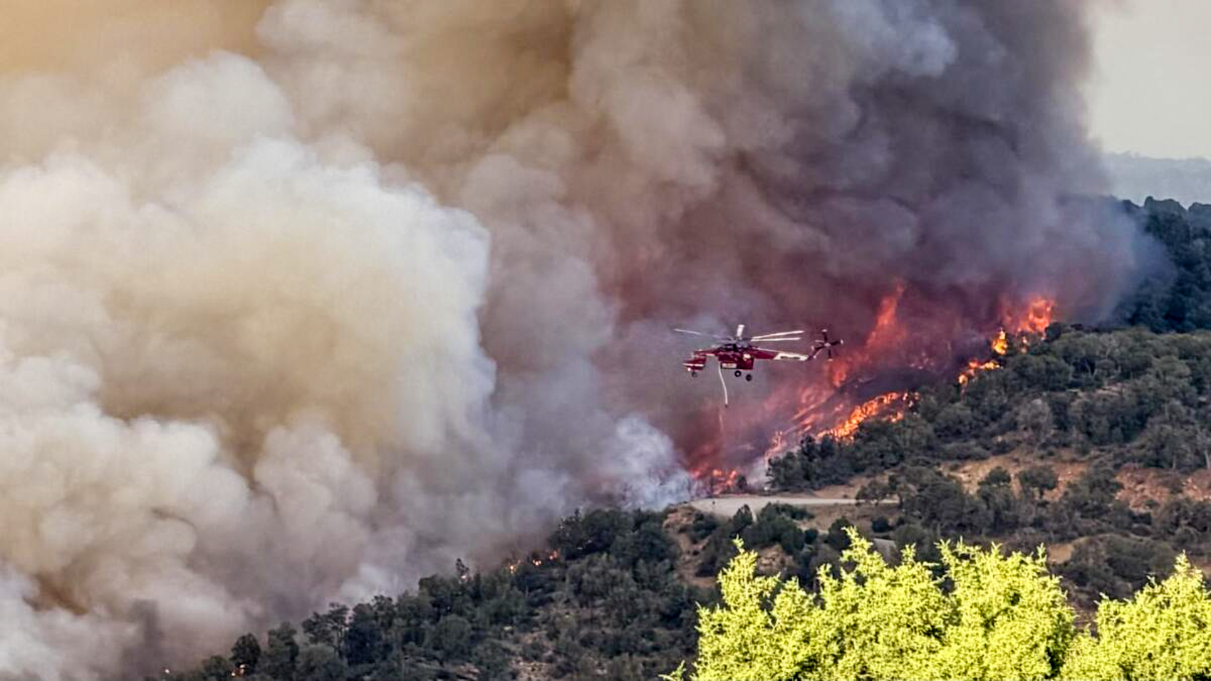 Firefighters working the Babylon Fire in San Juan County, Utah as drones support containment