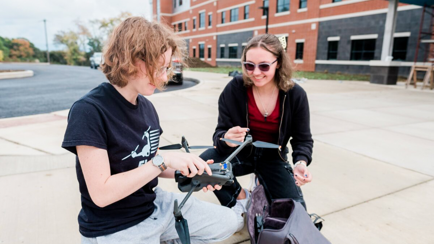 Students in the Fly Like A Girl academy practicing drone piloting in South Fayette Township