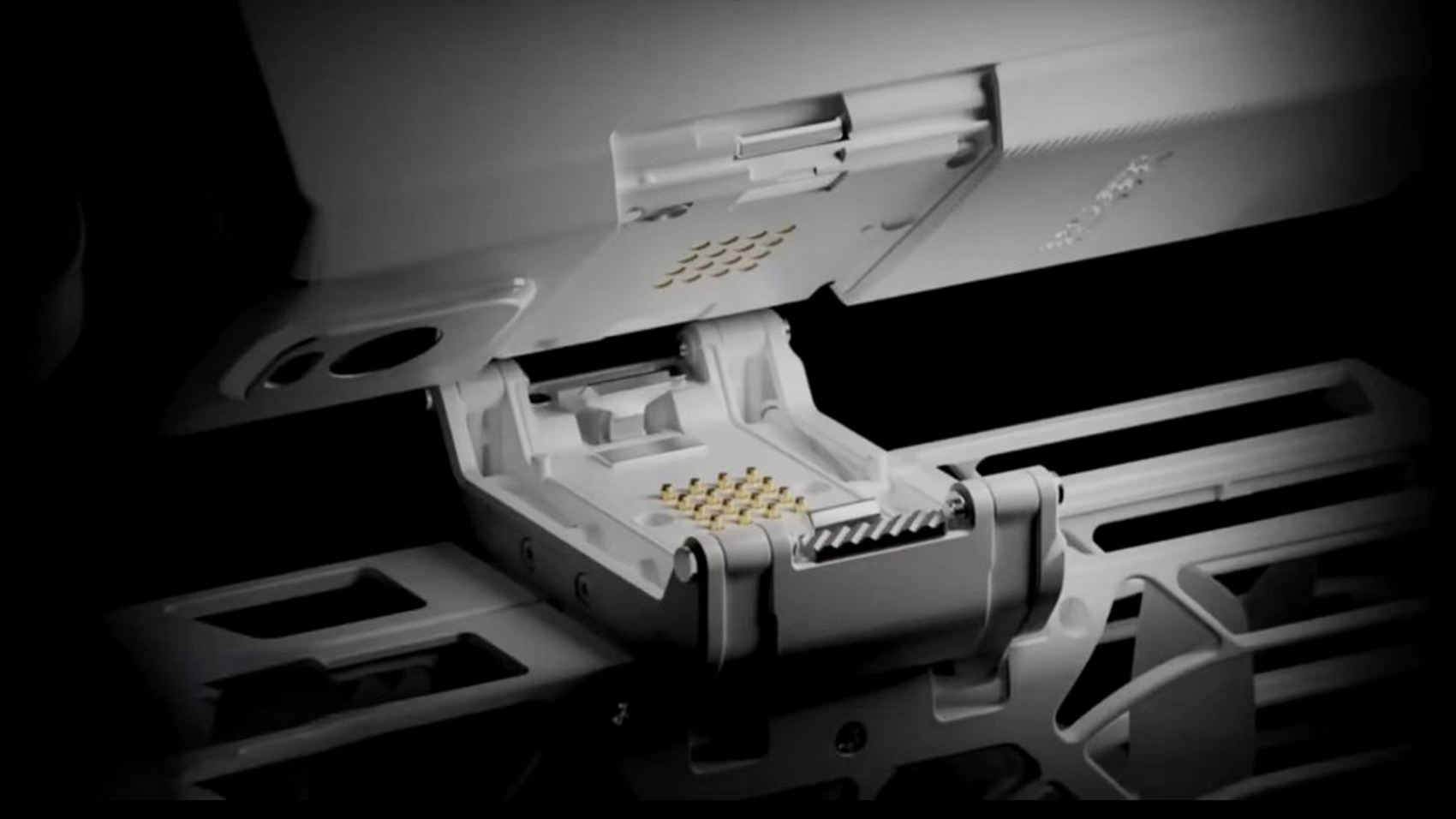 HoverAir teaser render showing a detachable camera module and caged flying camera body