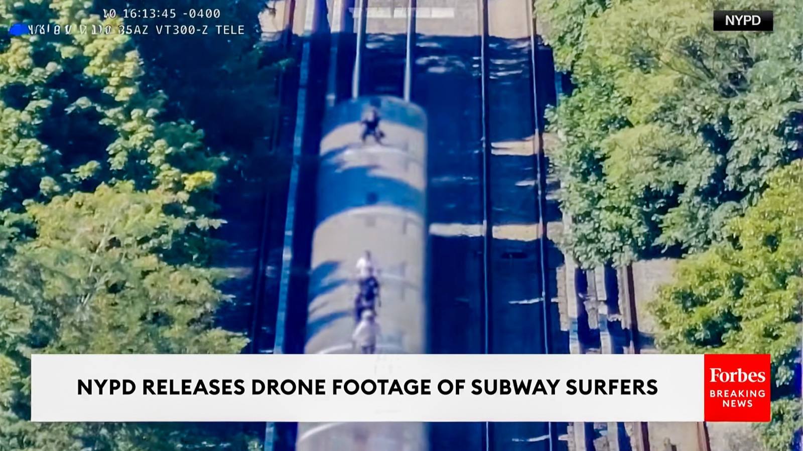 NYPD aerial view of subway surfers riding a B train in Brooklyn