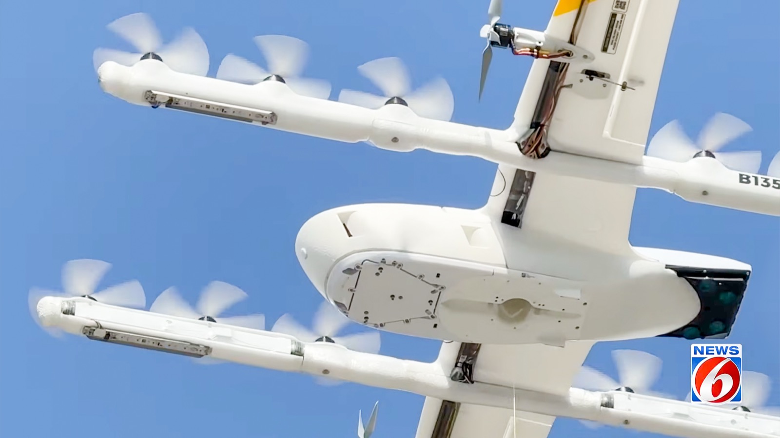 Close-up underside view of a Wing delivery drone