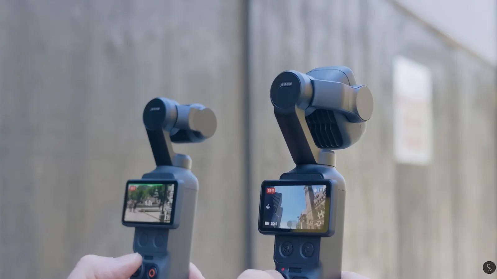 The DJI Osmo Pocket 4P and Osmo Pocket 4 side by side from behind, screens on, showing the Pocket 4P's larger gimbal
