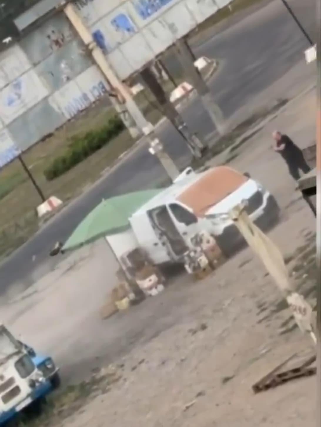 Russian FPV drone approaching Yurii's vegetable stand in Kherson as the 52-year-old seller runs for cover, August 4, 2026