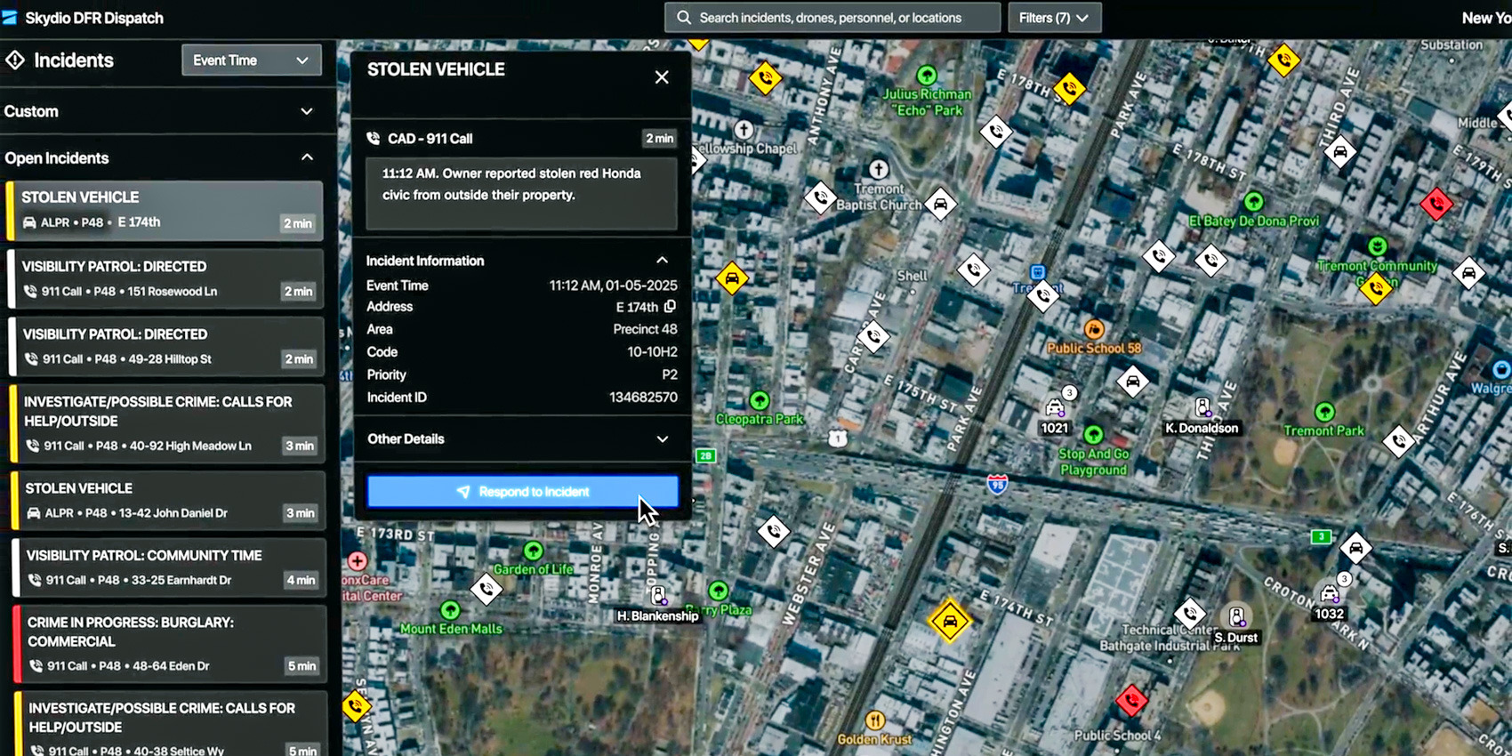 The Skydio DFR Dispatch interface shows a queue of open 911 incidents beside a city map, with a stolen vehicle call opened and a Respond to incident button highlighted.