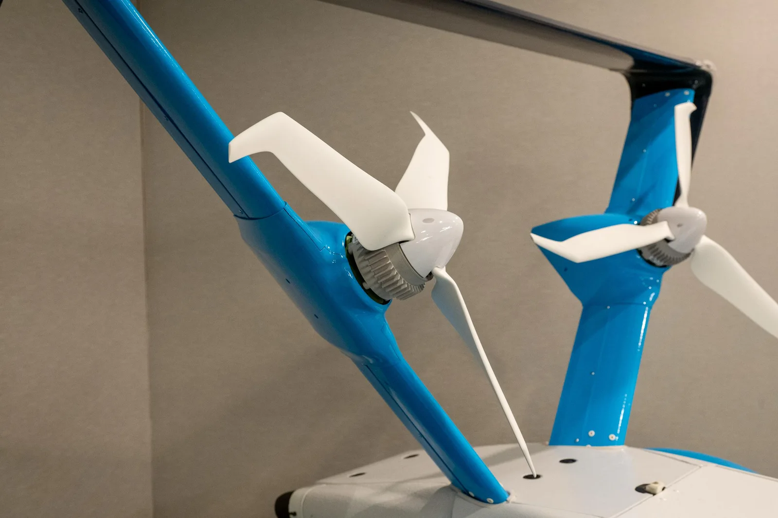Close-up of the Amazon MK30 drone's blue propeller arms and folding propeller blades