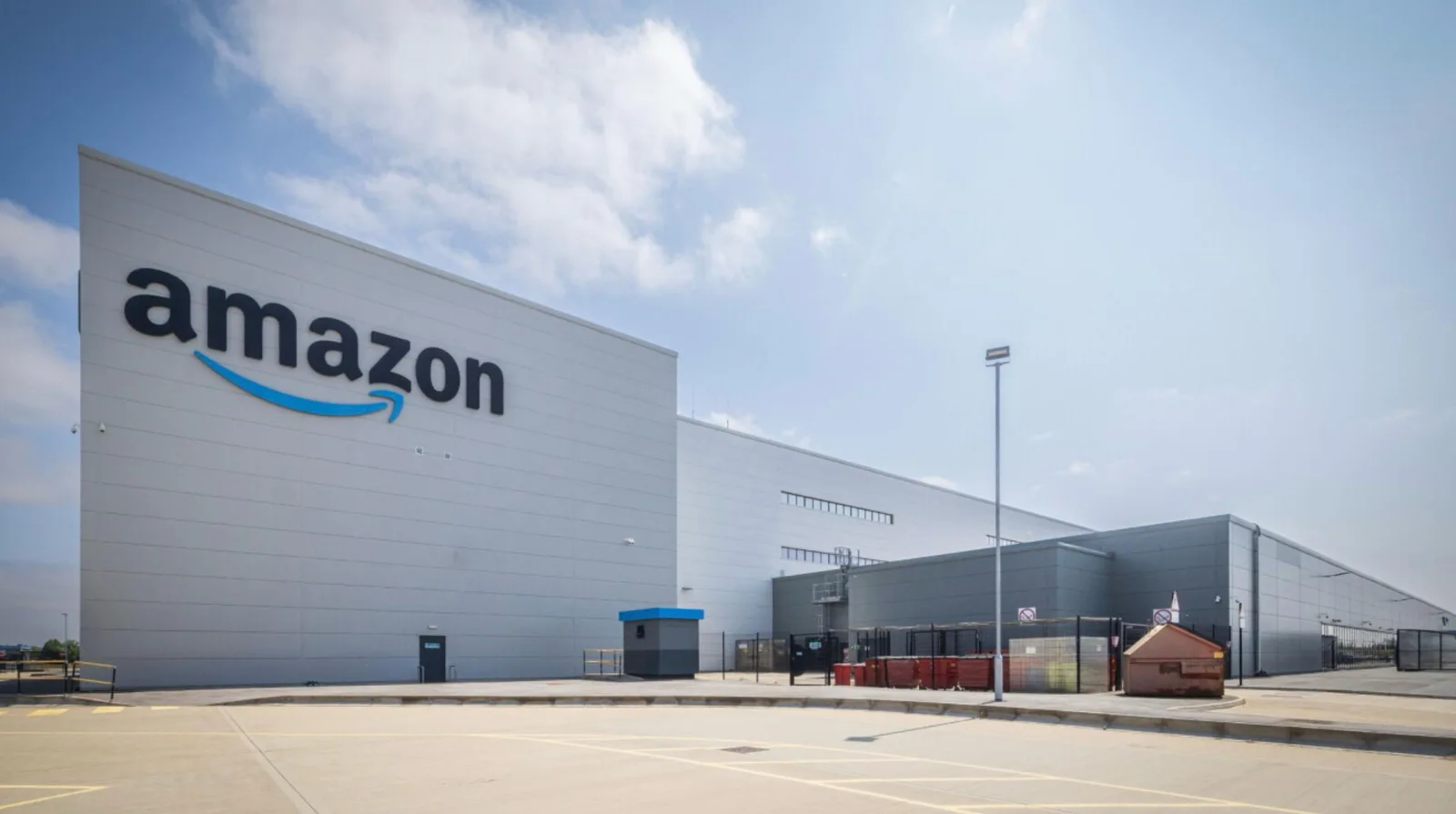 Amazon fulfillment center building with the Amazon logo in the United Kingdom