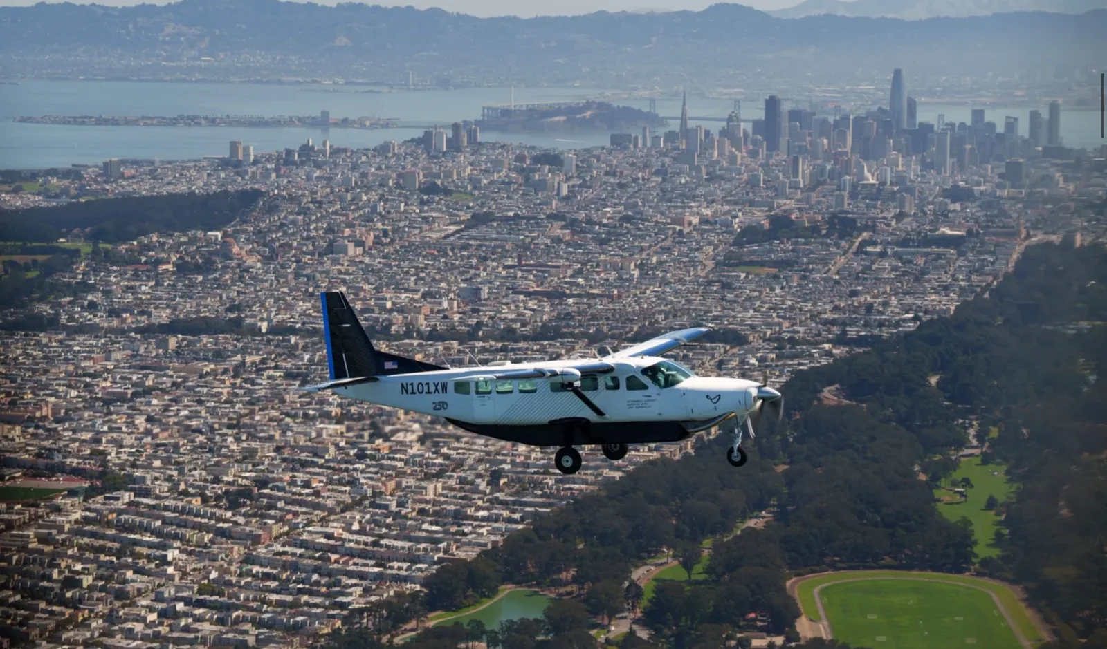 Joby J208 converted Cessna Caravan flying over the San Francisco skyline and bay