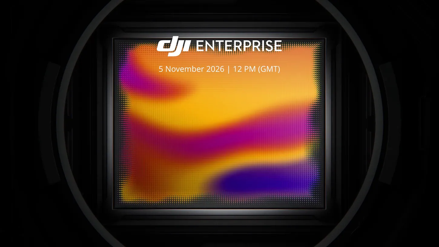 Rendered rectangular image sensor with a visible pixel grid glowing orange, purple and yellow, mounted inside a dark circular lens barrel, with the DJI Enterprise logo and 5 November 2026 12 PM GMT above it