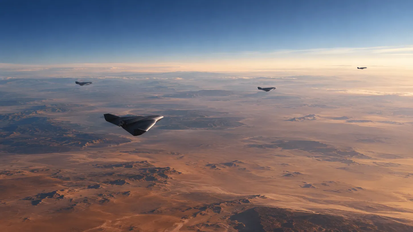 Render of four black delta-wing drones flying at different distances over a desert at sunrise